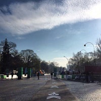 a city street with a street sign in the middle of it